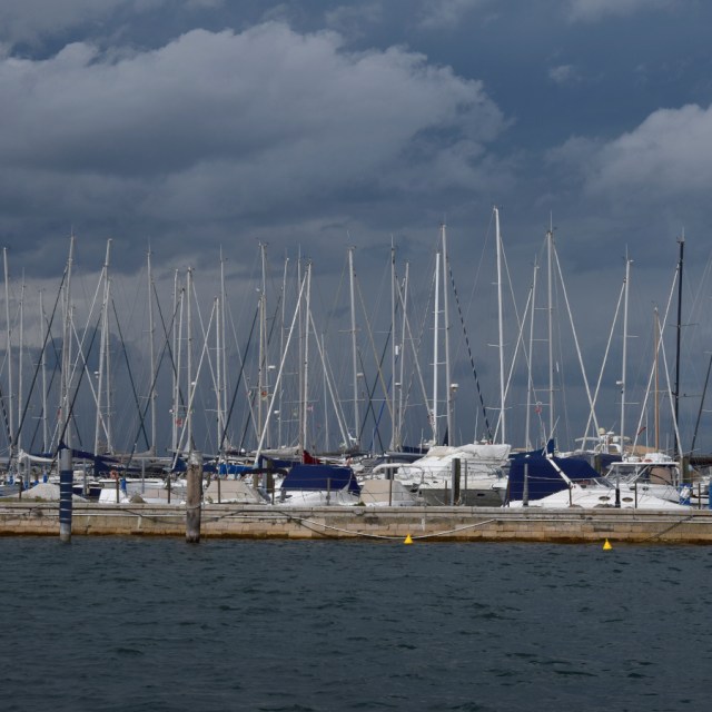 Parked yachts in Chioggia's marina bracing themselves for upcoming bad weather.